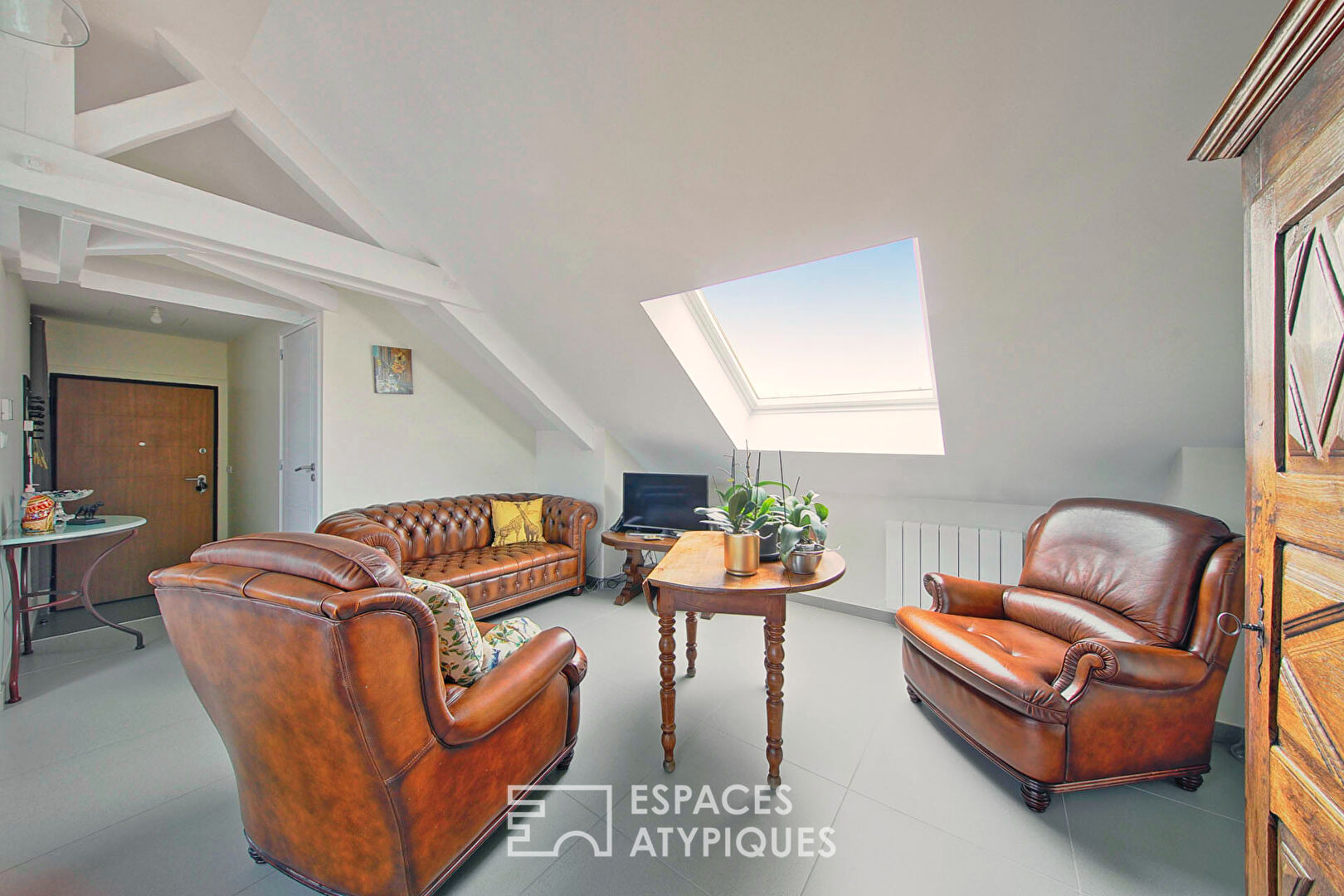 Appartement de charme niché sous les toits