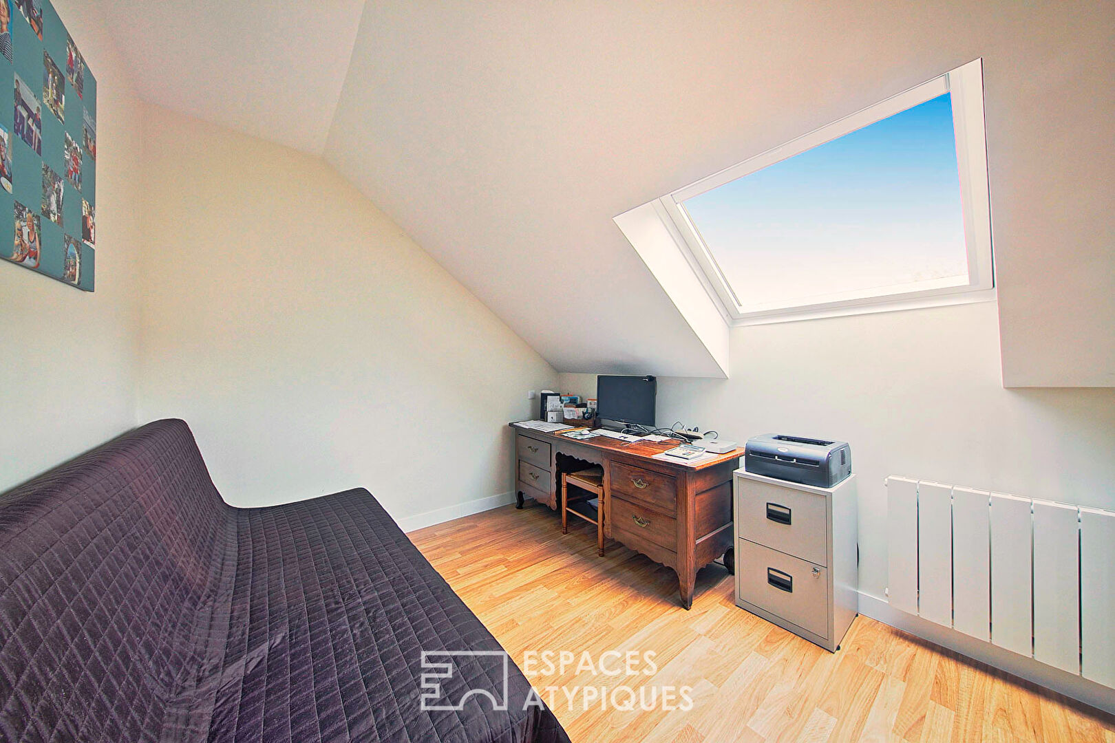 Appartement de charme niché sous les toits
