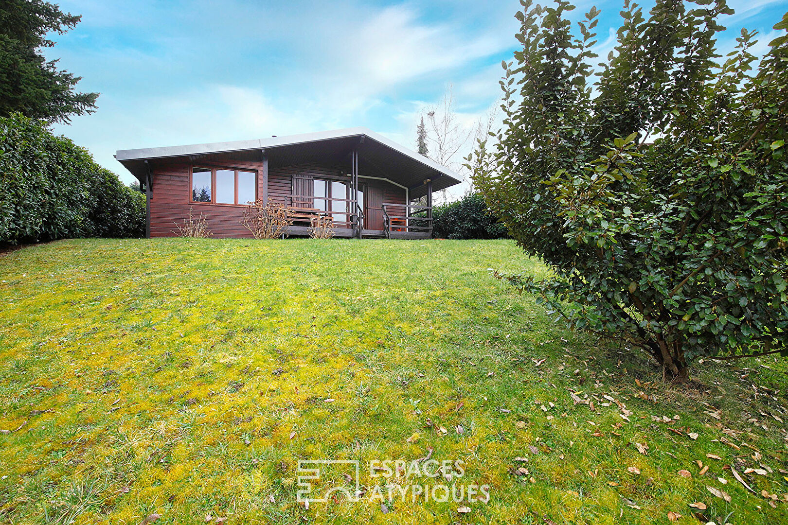 Renovated wooden house with garden and lake view