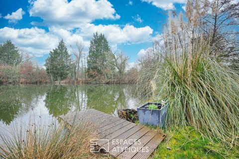 Renovated wooden house with garden and lake view