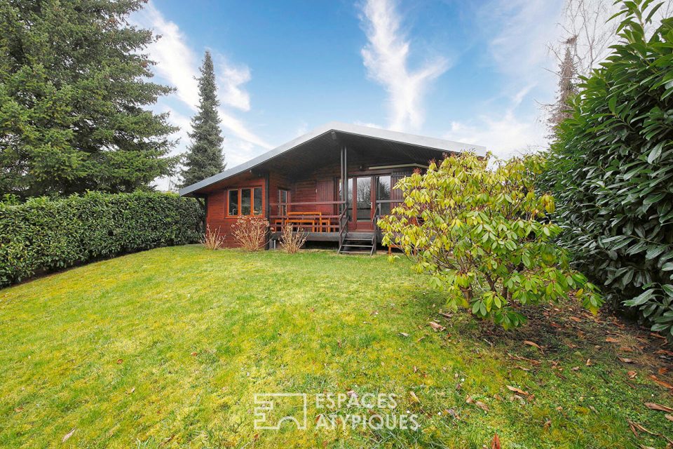 Maison en bois rénovée avec jardin et vue lac