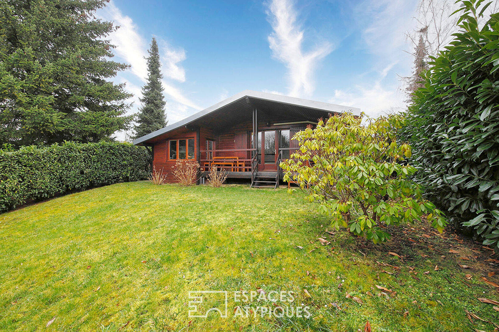 Renovated wooden house with garden and lake view