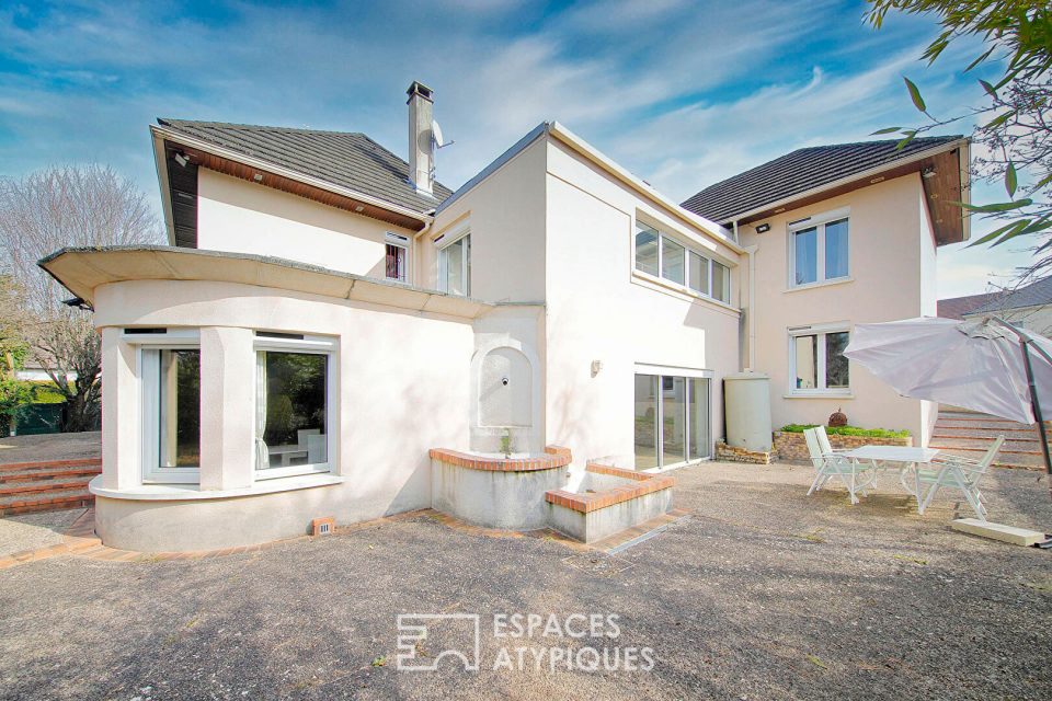 Maison familiale et atypique avec jardin