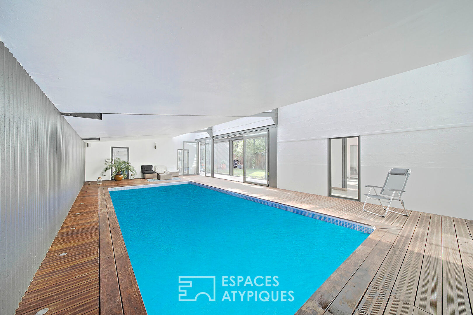 loft with patio and indoor pool