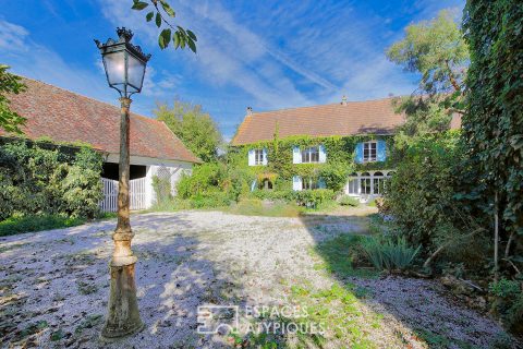 Beautiful character house with barn and large wooded garden