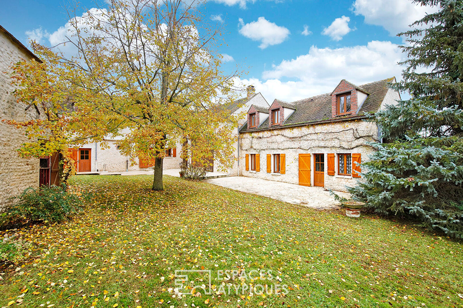 Old 18th century farmhouse with outbuilding and garden