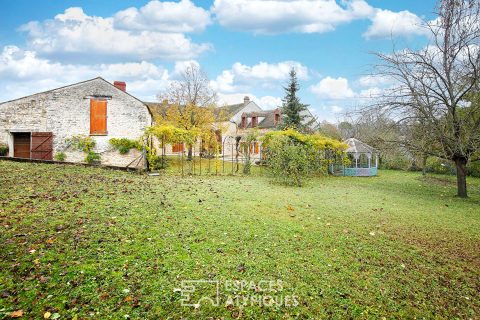 Old 18th century farmhouse with outbuilding and garden
