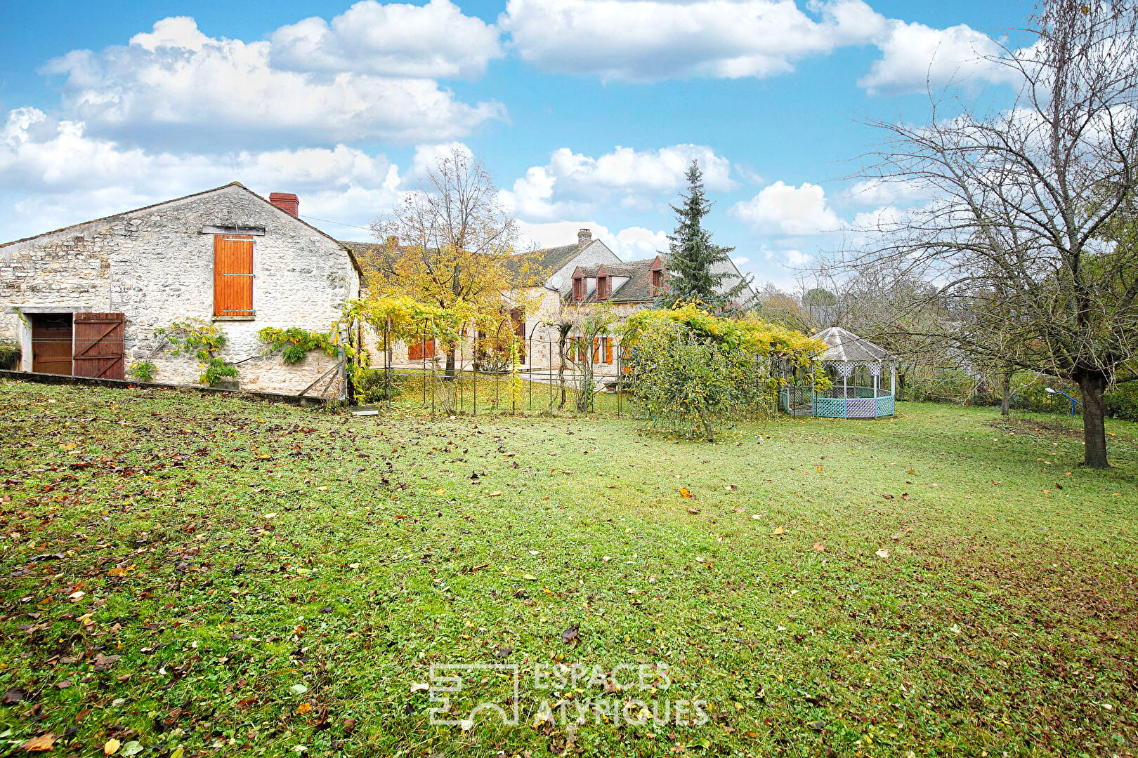 Old 18th century farmhouse with outbuilding and garden
