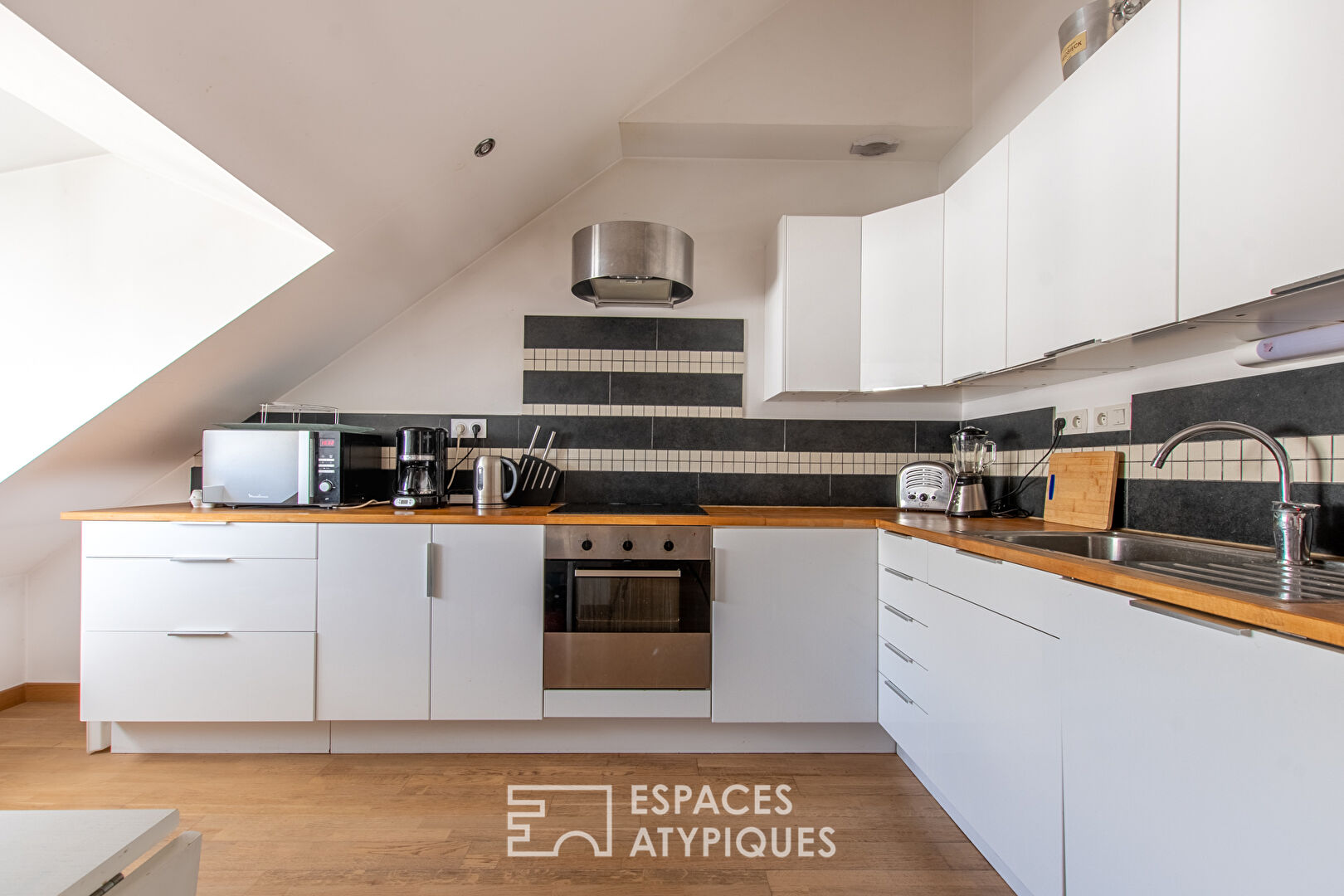 Duplex lumineux sous les toits