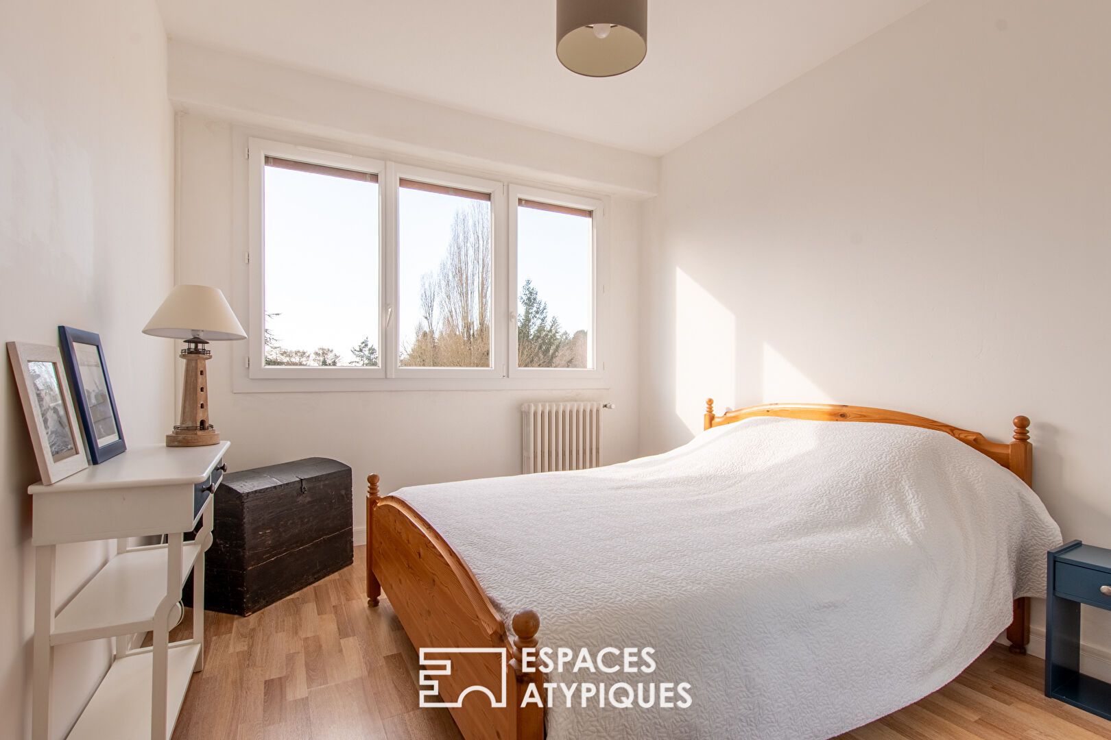 Appartement lumineux dans son écrin de verdure