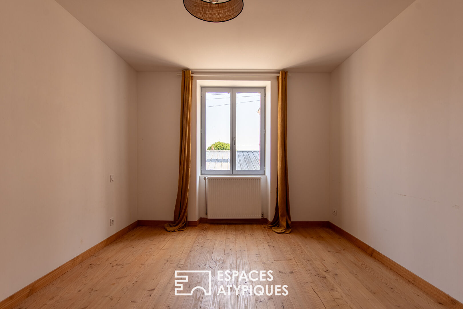 Entre vignes et rivière, une maison de caractère au charme confidentiel