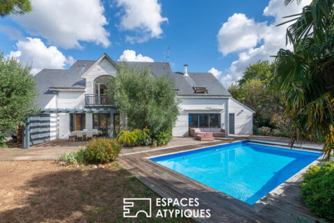 Maison d’architecte au cadre privilégié