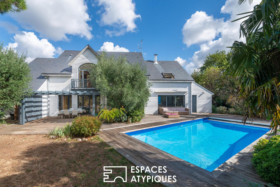 Maison d'architecte au cadre privilégié