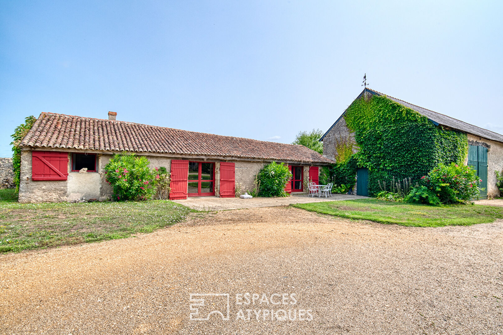 15th-century Seigneurie and its outbuildings in a verdant setting