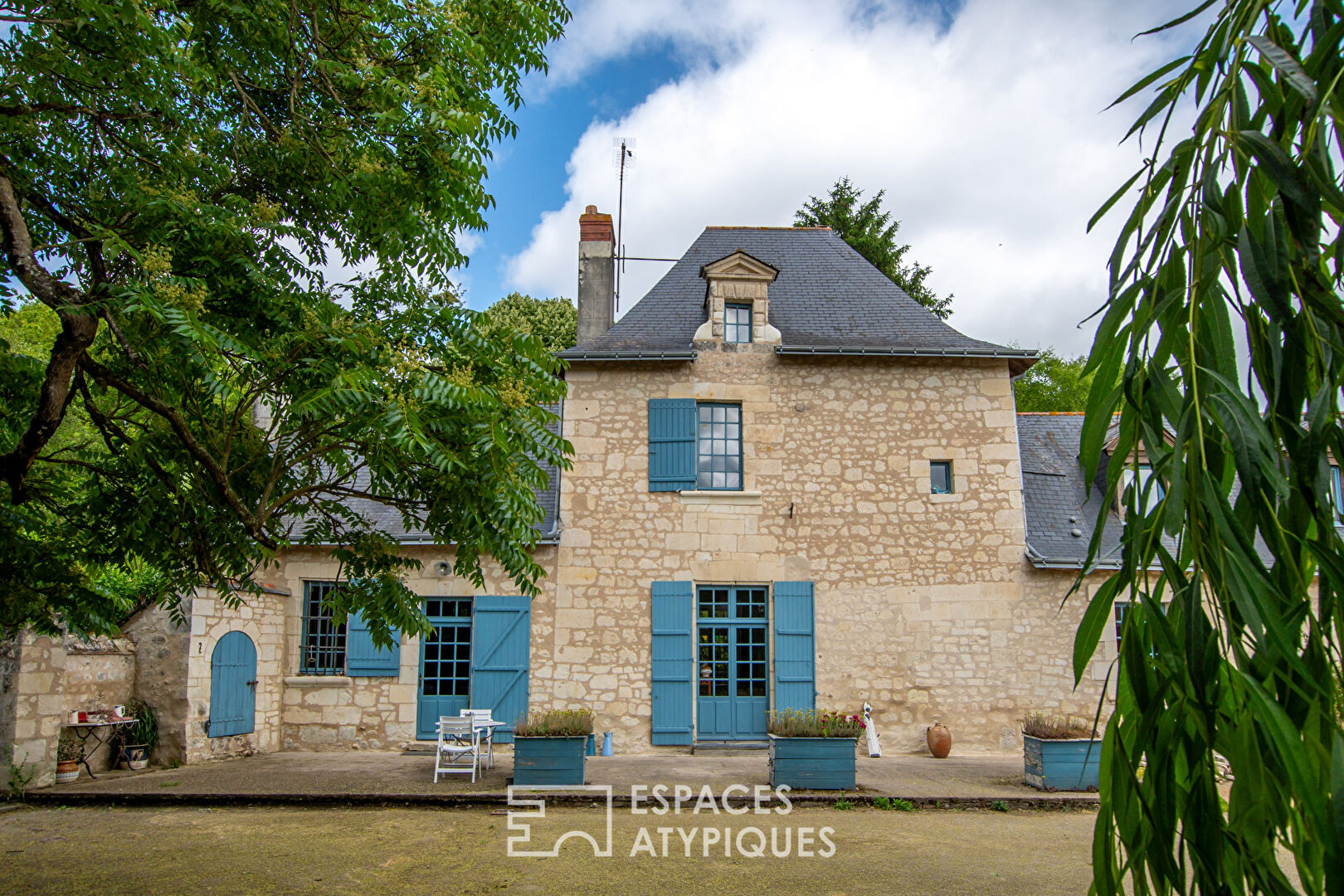 17th century tuffeau stone haven in the heart of a characterful village