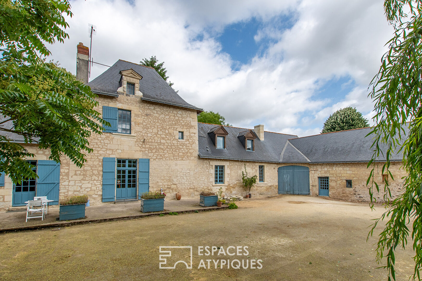 17th century tuffeau stone haven in the heart of a characterful village