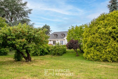Maison dans son parc avec vie de plain-pied