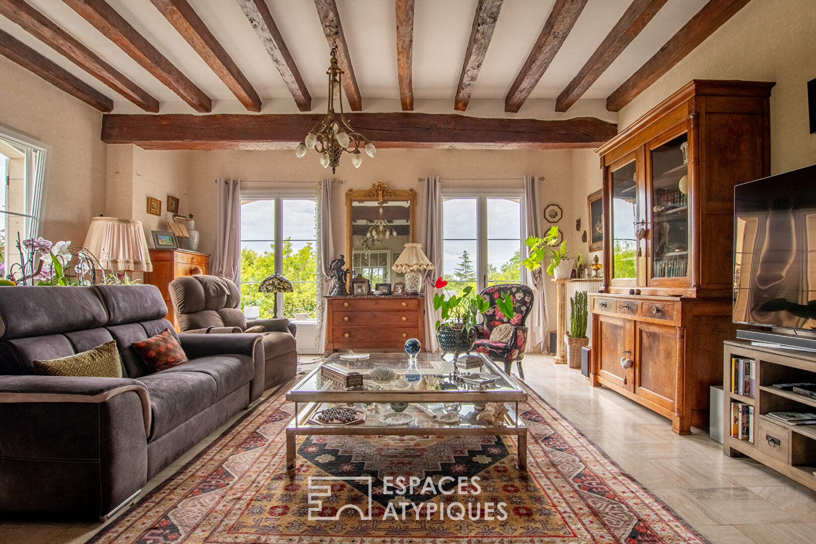 Maison dans son parc avec vie de plain-pied