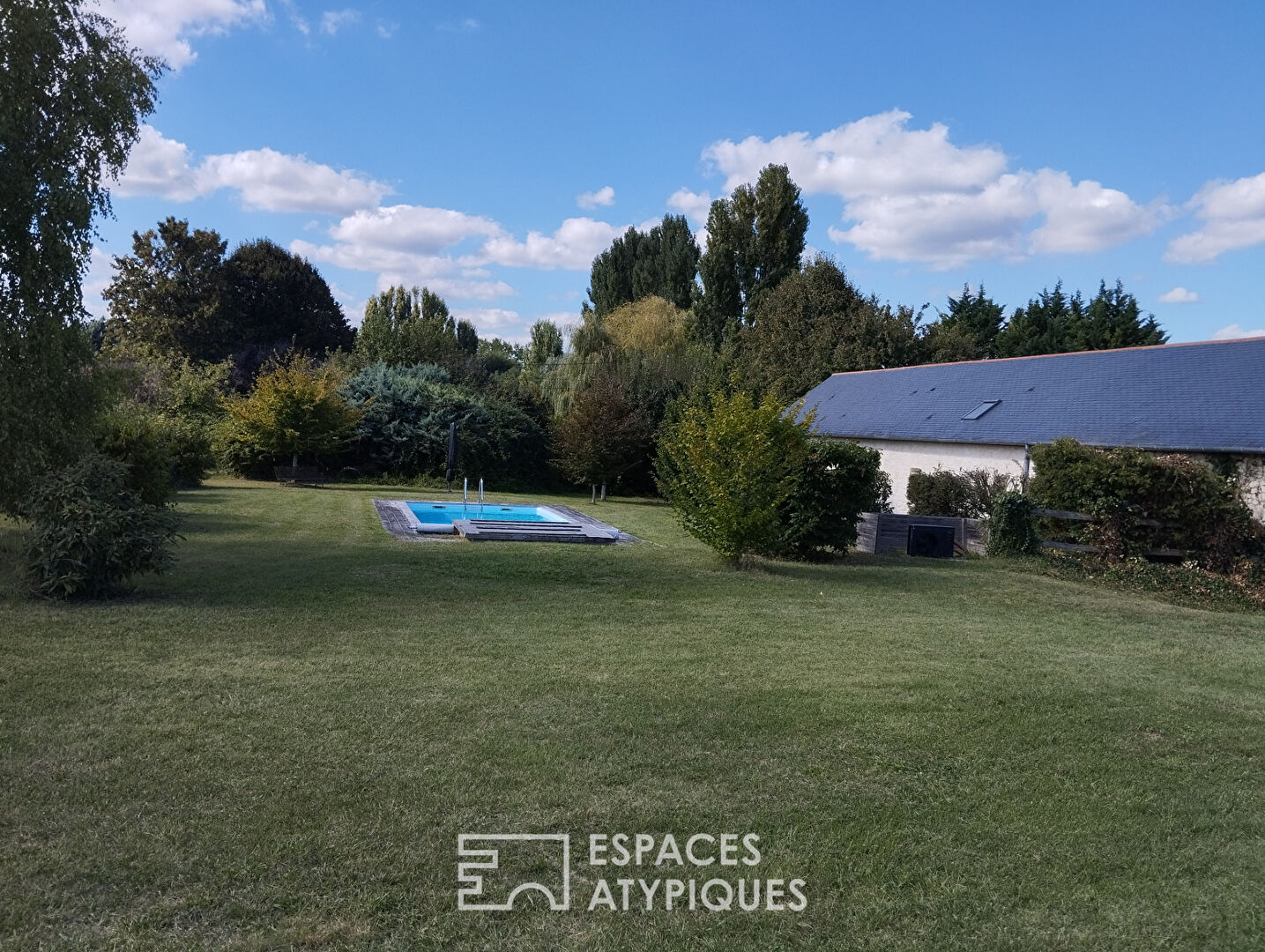 Beautiful property in a rural setting with meadow and boxes for horses