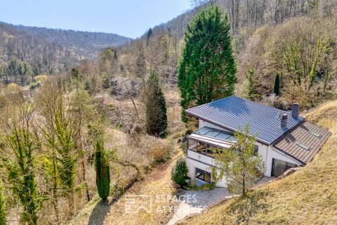 House in a green setting with panoramic view