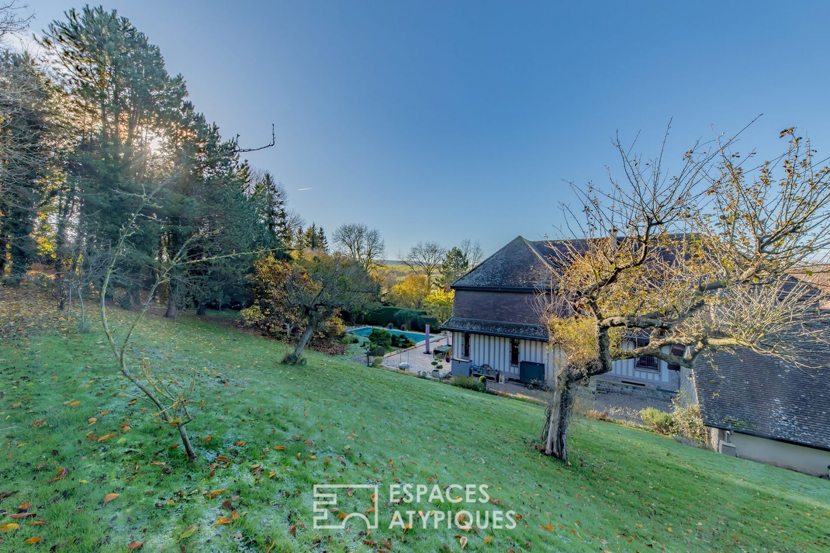 Anglo-Norman property and its landscaped park with swimming pool