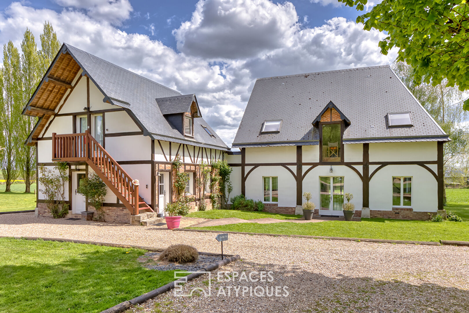 Renovated old riding school, combining Norman charm and spectacular volumes