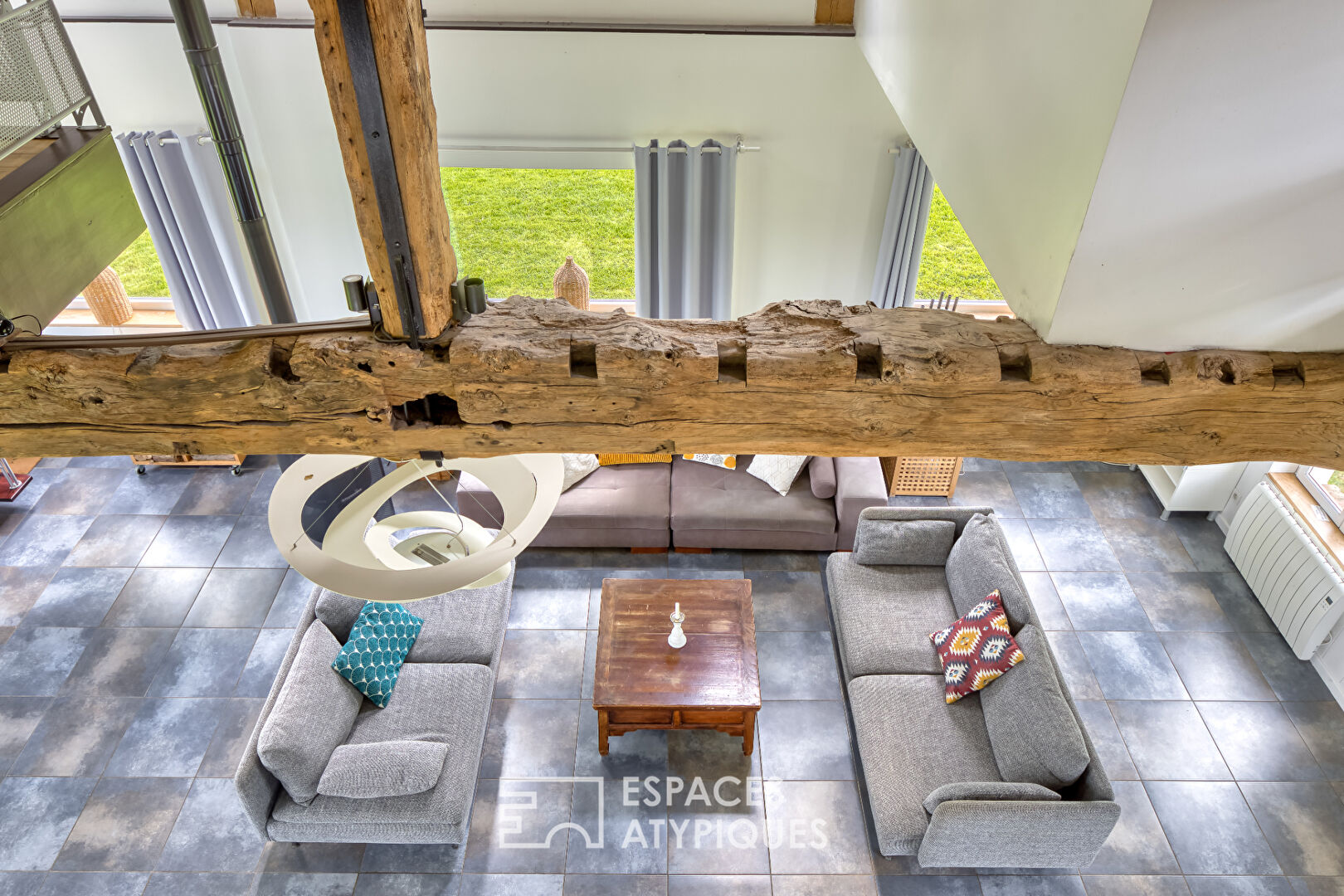 Renovated old riding school, combining Norman charm and spectacular volumes
