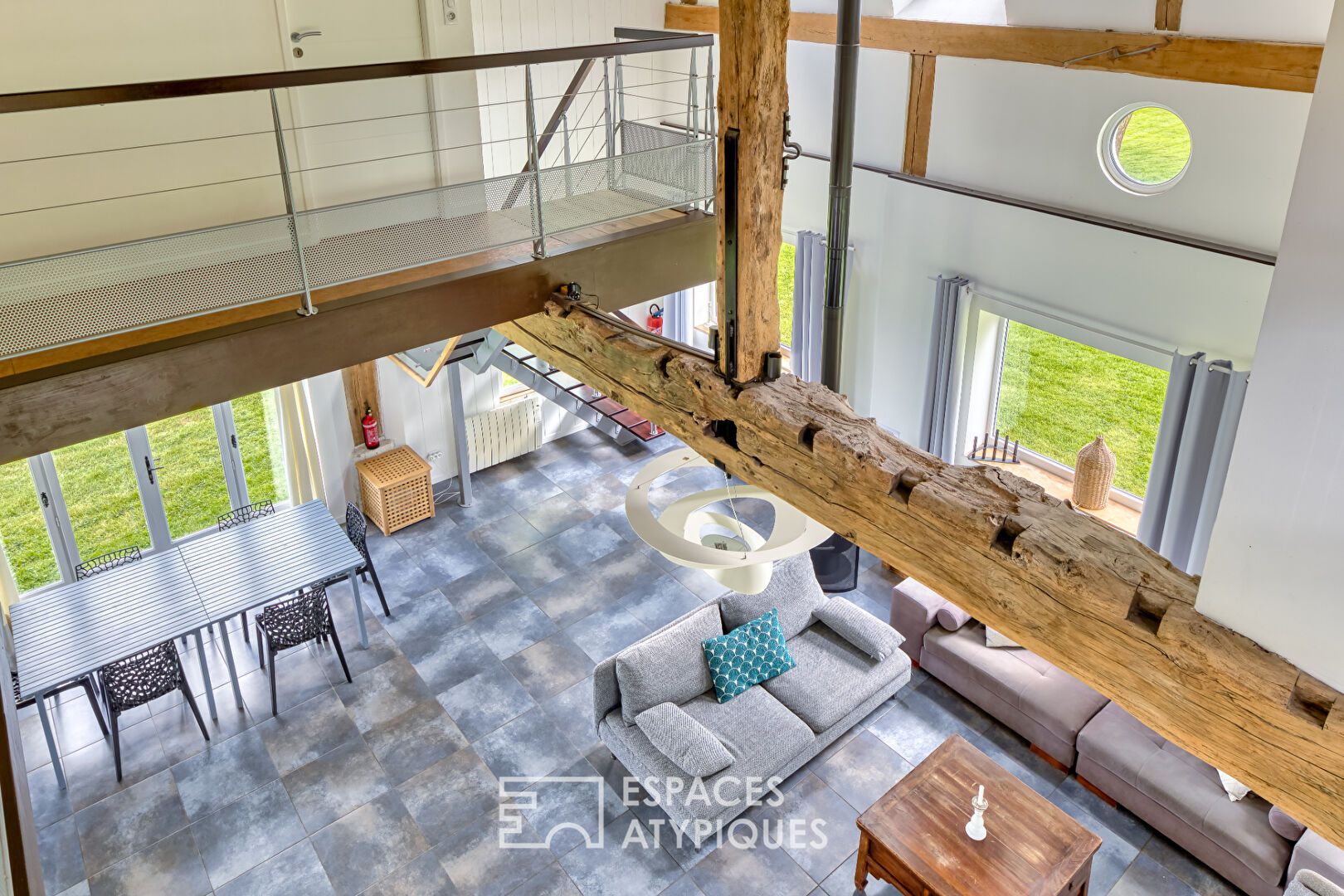 Renovated old riding school, combining Norman charm and spectacular volumes