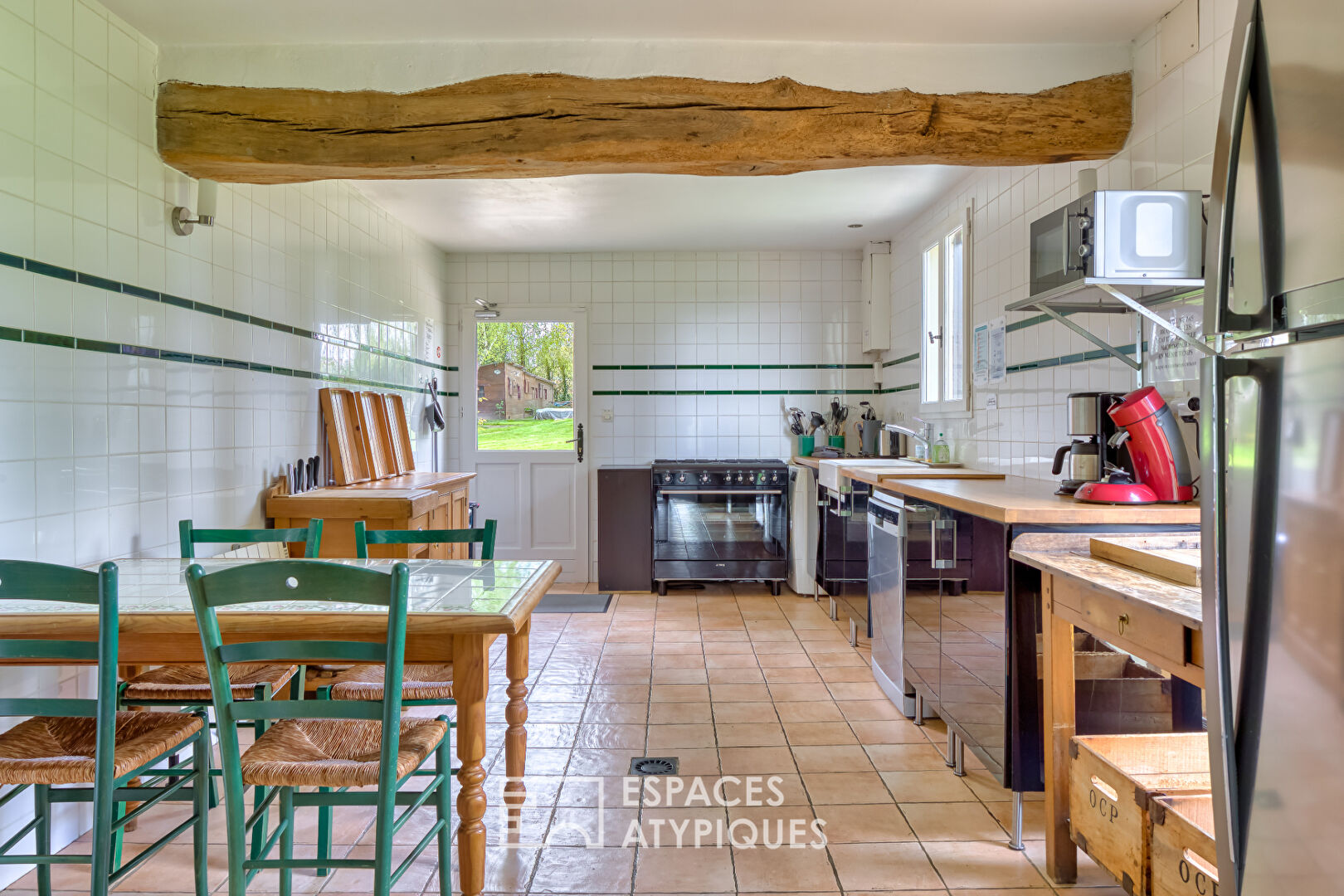 Renovated old riding school, combining Norman charm and spectacular volumes
