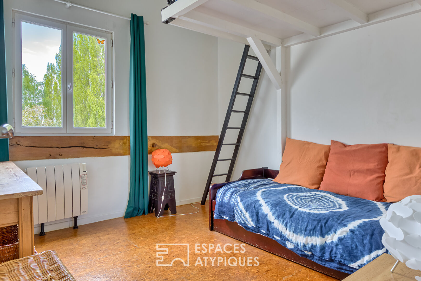 Renovated old riding school, combining Norman charm and spectacular volumes