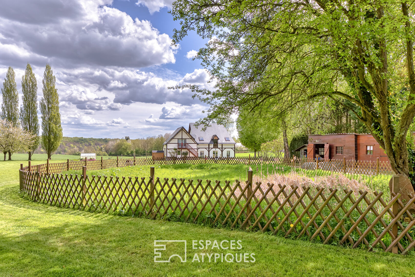 Renovated old riding school, combining Norman charm and spectacular volumes