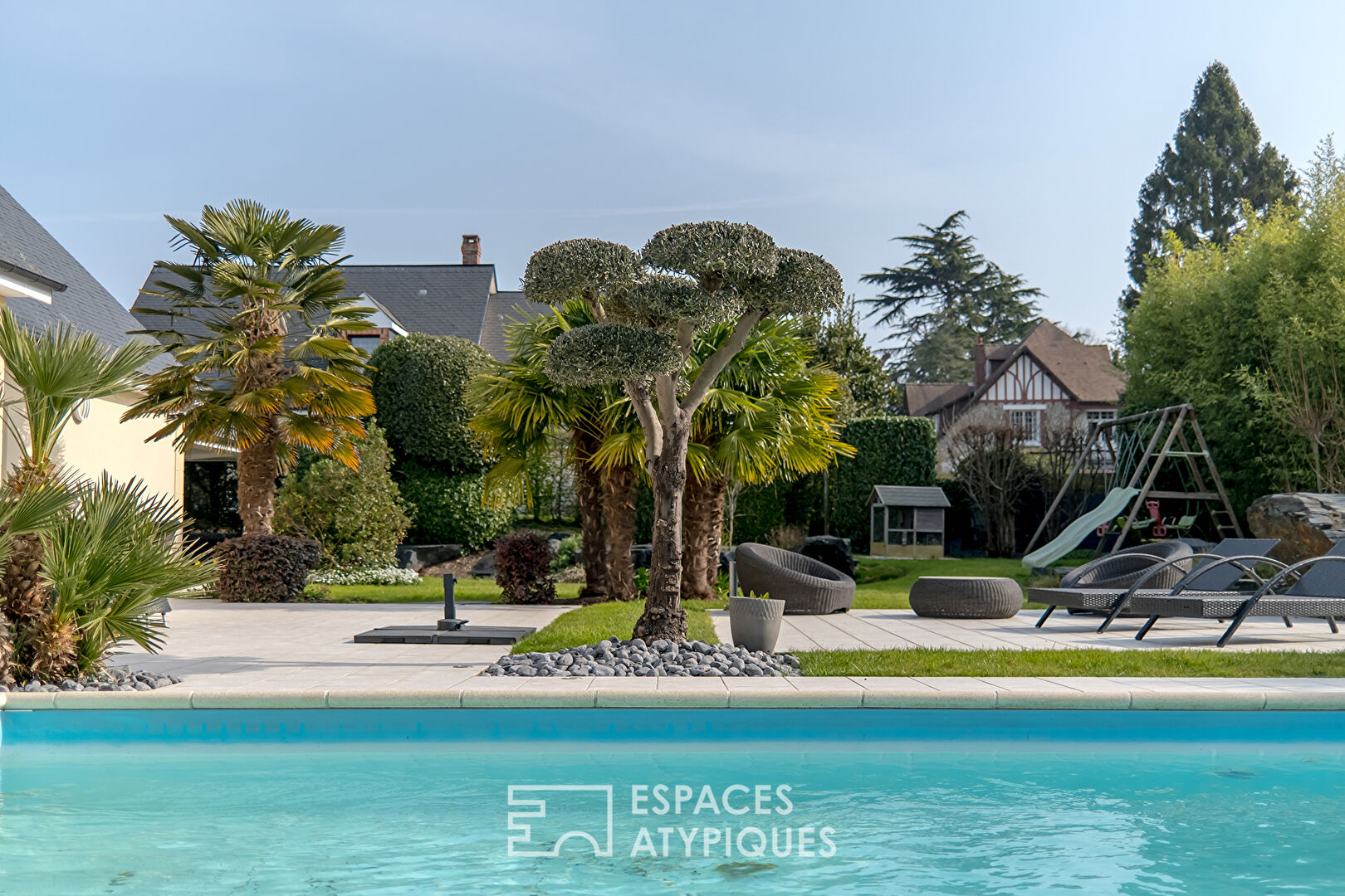 Contemporary house with swimming pool and outbuilding