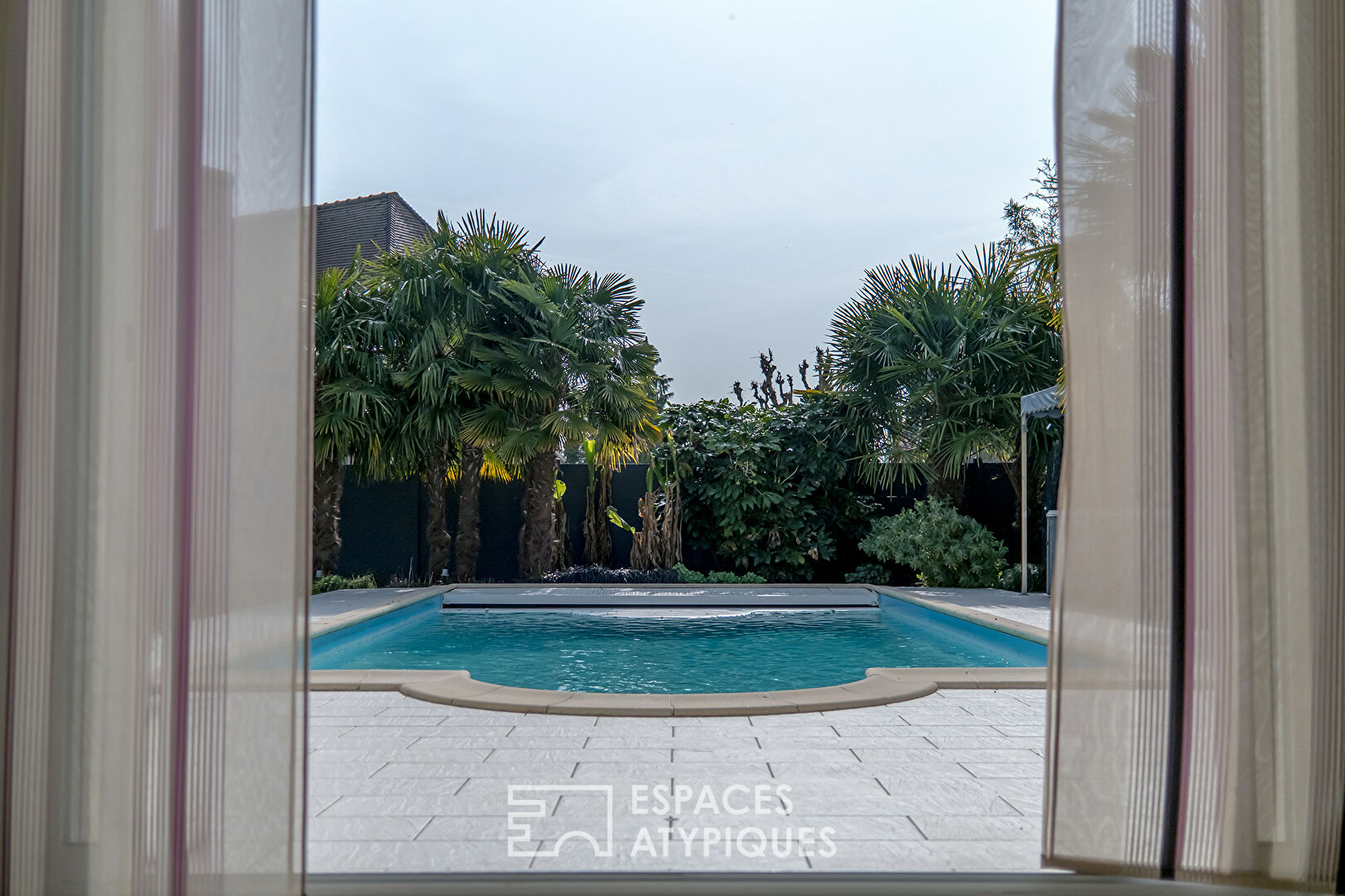 Contemporary house with swimming pool and outbuilding
