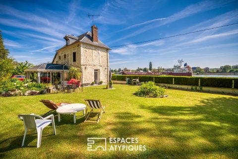 Heurteauville house istone on the banks of the Seine