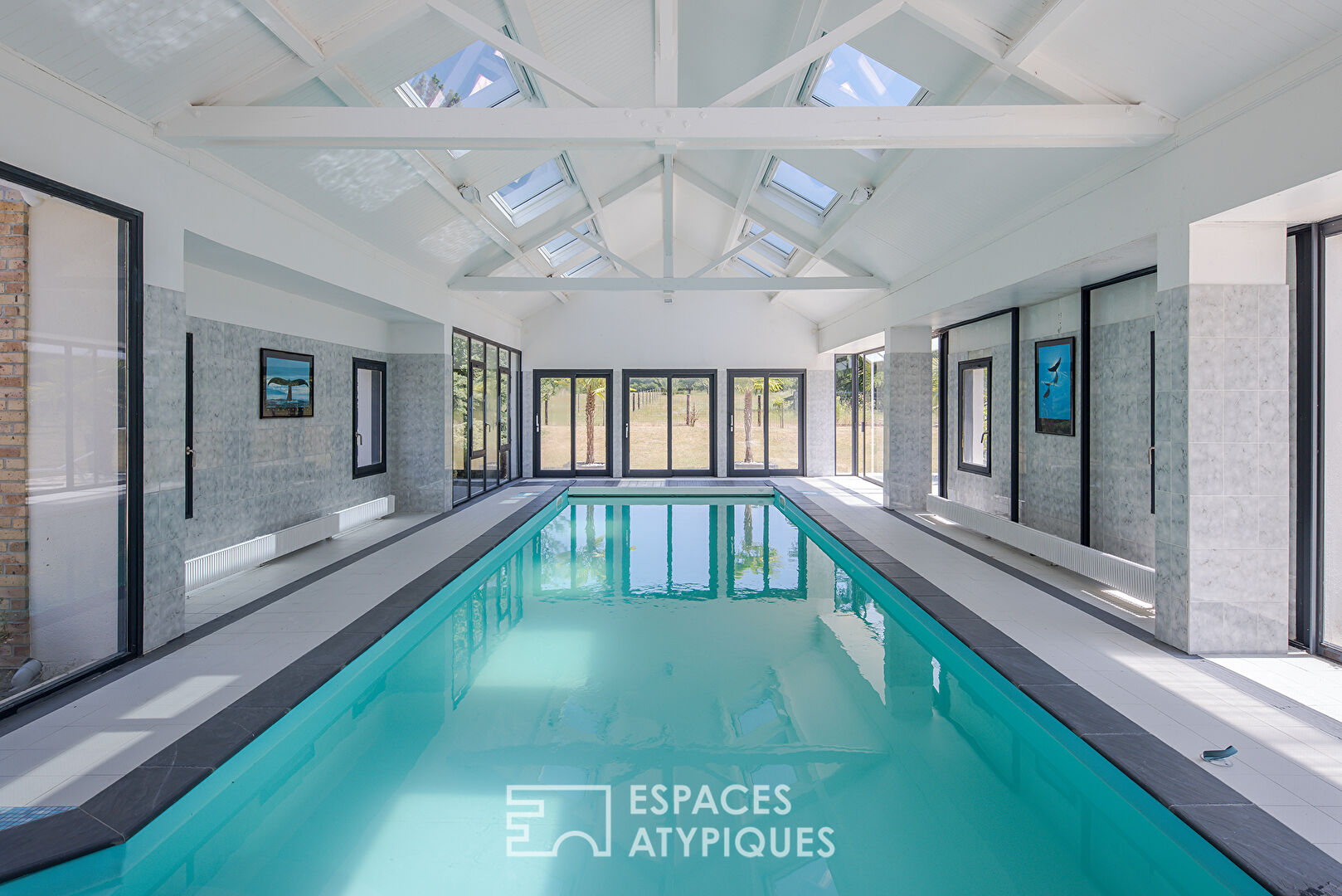 Manoir d’architecte d’exception avec piscine et paddocks dans un parc de 3 hectares