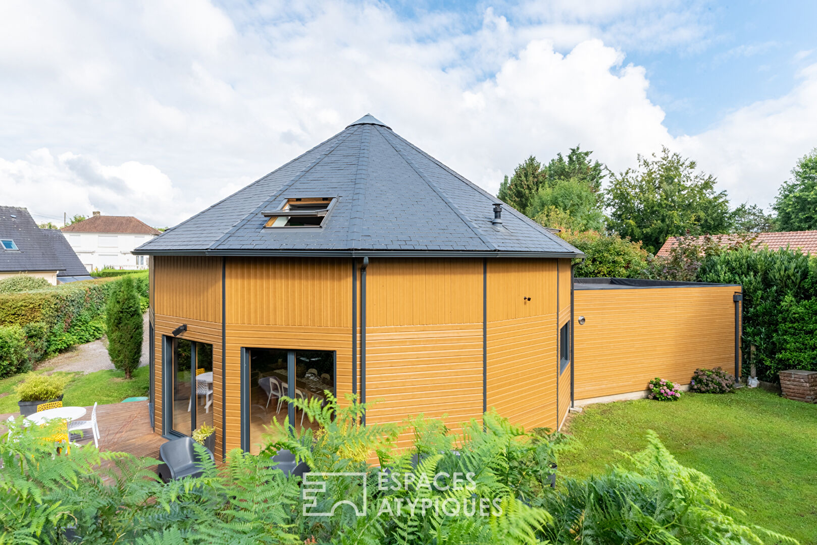 Maison polygonale en bois et sa conception bioclimatique