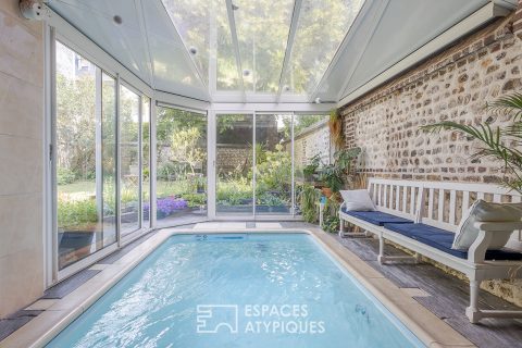 Maison généreuse avec buanderie, jardin et piscine