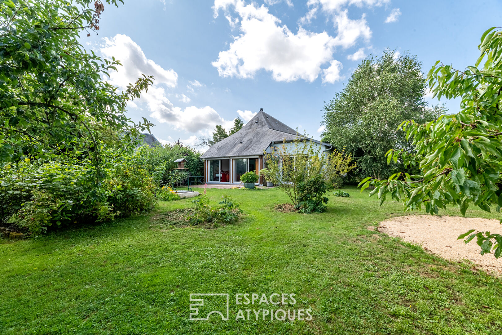 Artist’s farmhouse with its beautiful landscaped garden