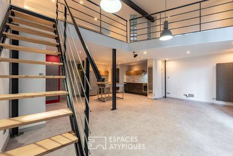 Loft with terrace in a former cotton mill