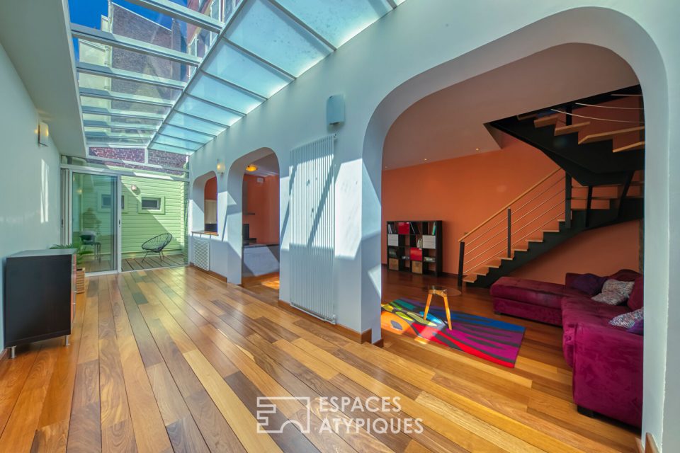Duplex issu d'anciens bureaux revisités reliés à un appartement de charme
