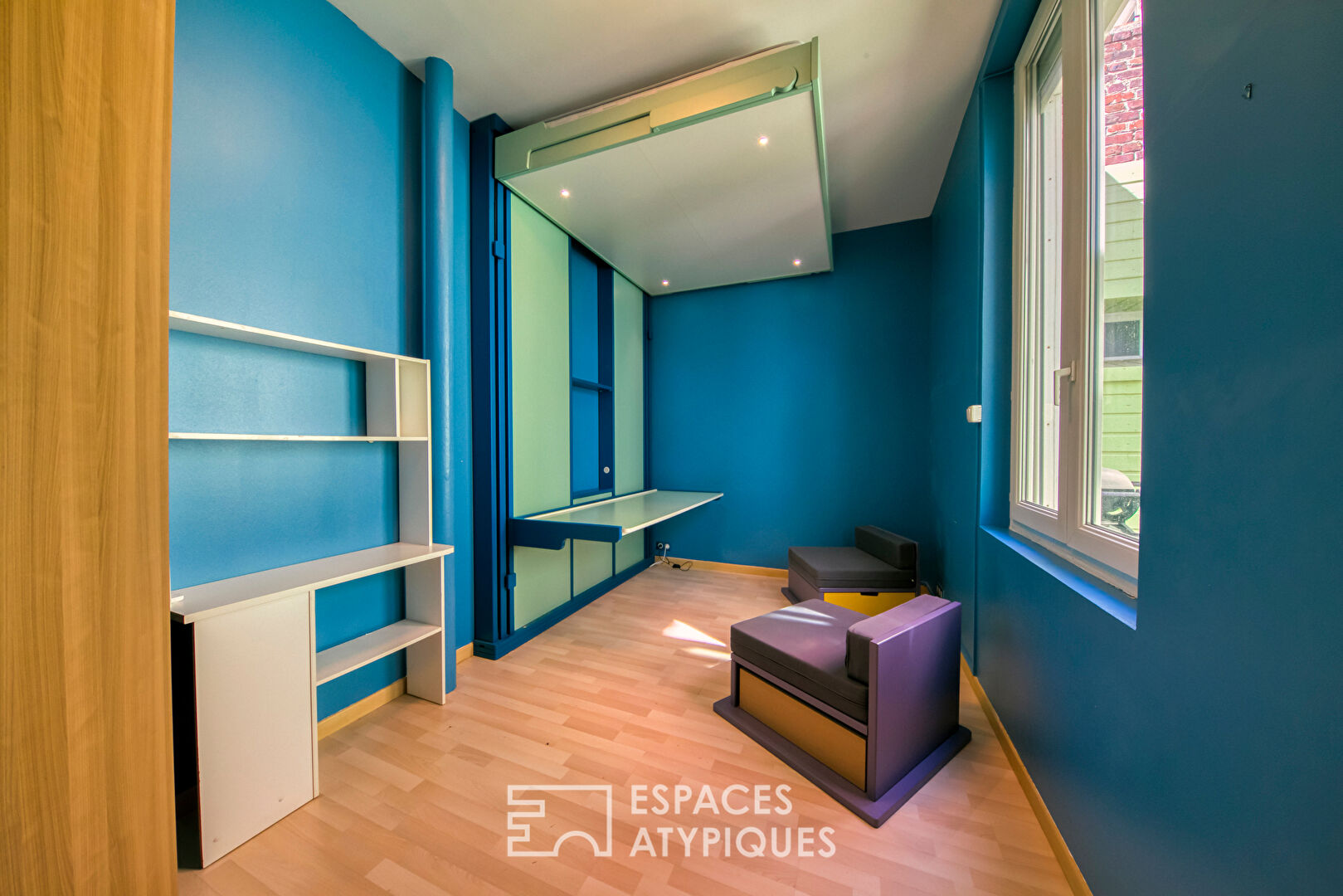 Duplex issu d’anciens bureaux revisités reliés à un appartement de charme