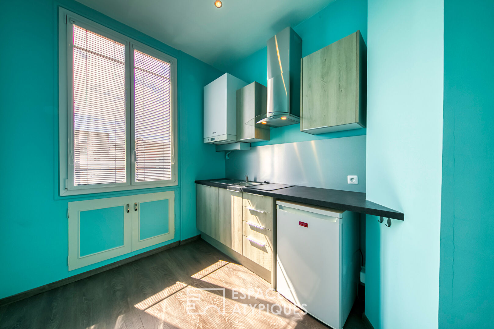 Duplex issu d’anciens bureaux revisités reliés à un appartement de charme