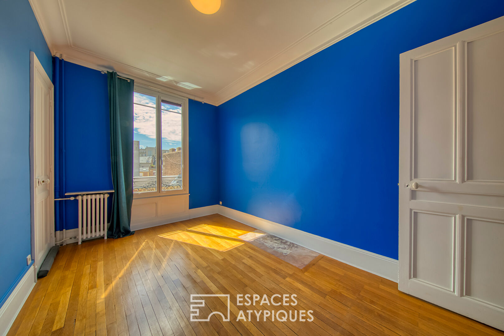 Duplex issu d’anciens bureaux revisités reliés à un appartement de charme