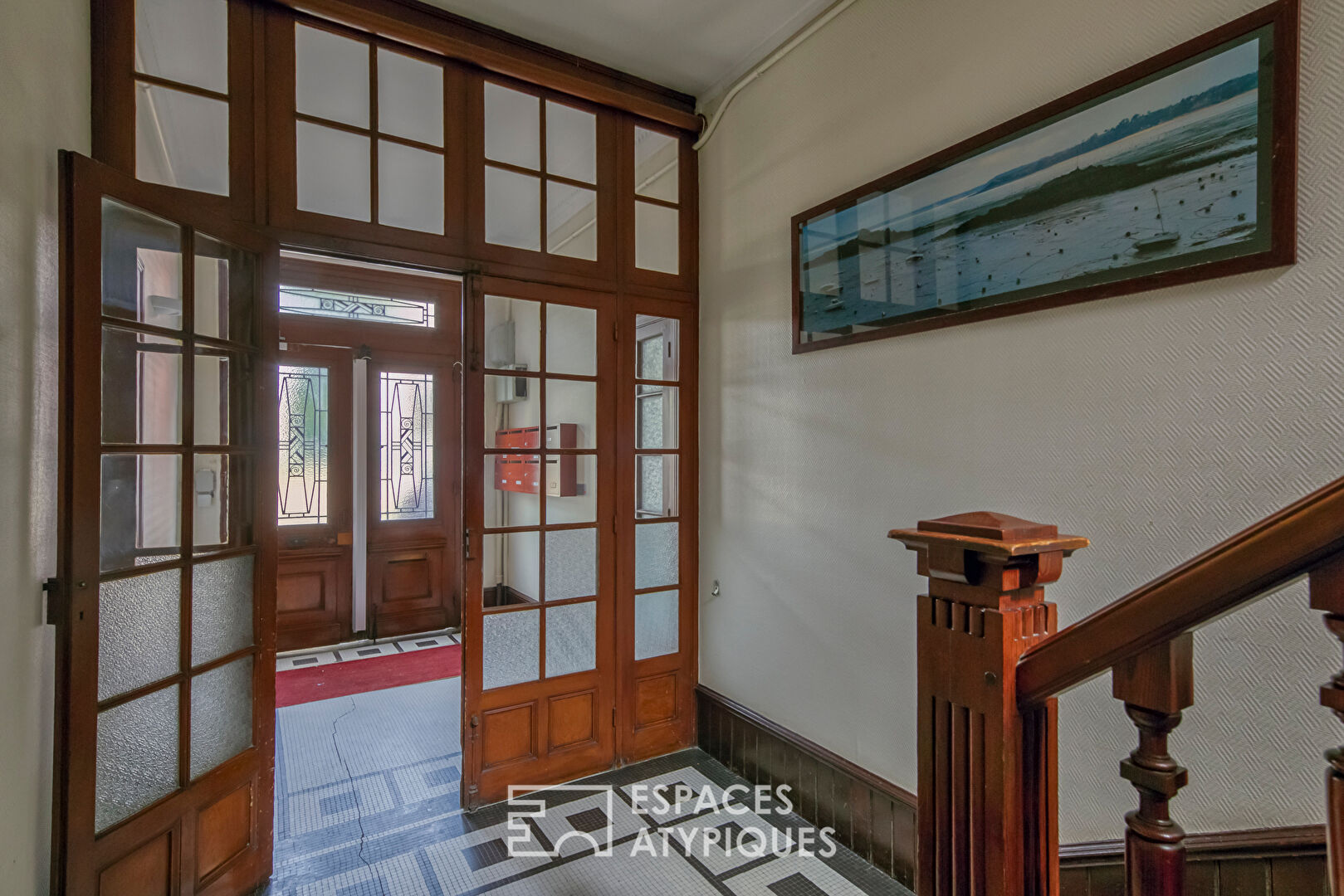 Duplex issu d’anciens bureaux revisités reliés à un appartement de charme