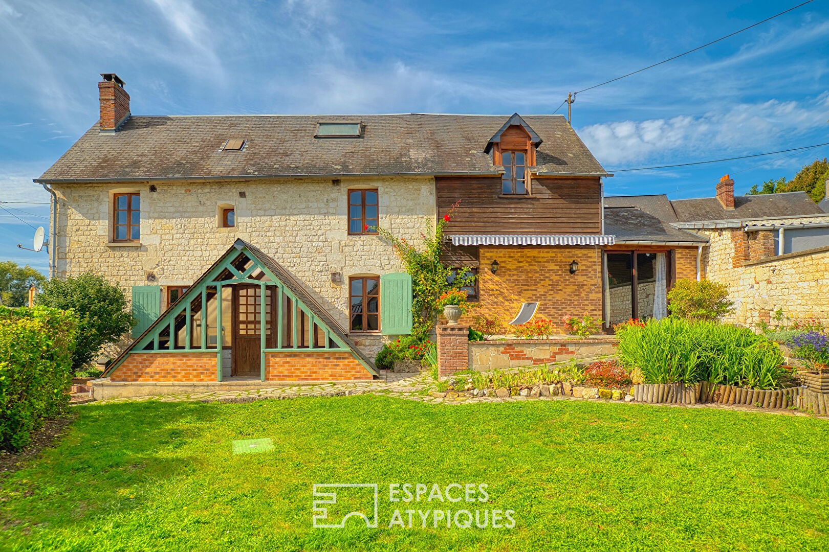 Stone village house with garden from a former business