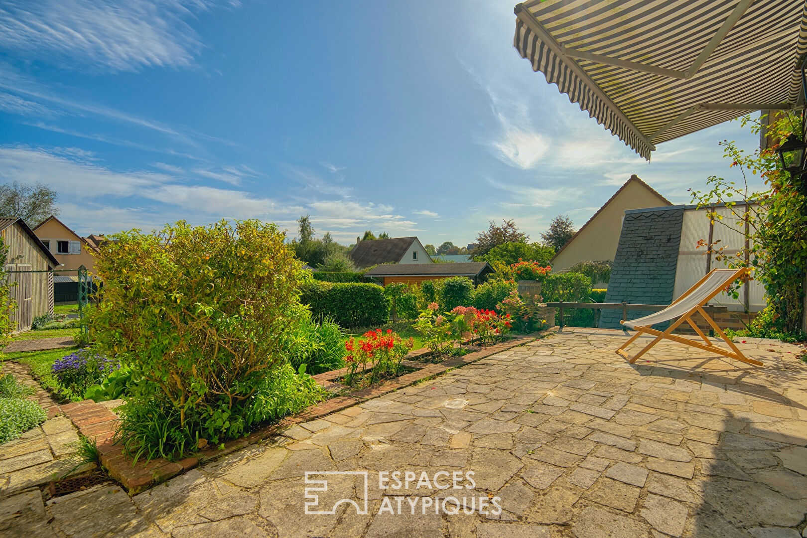 Stone village house with garden from a former business