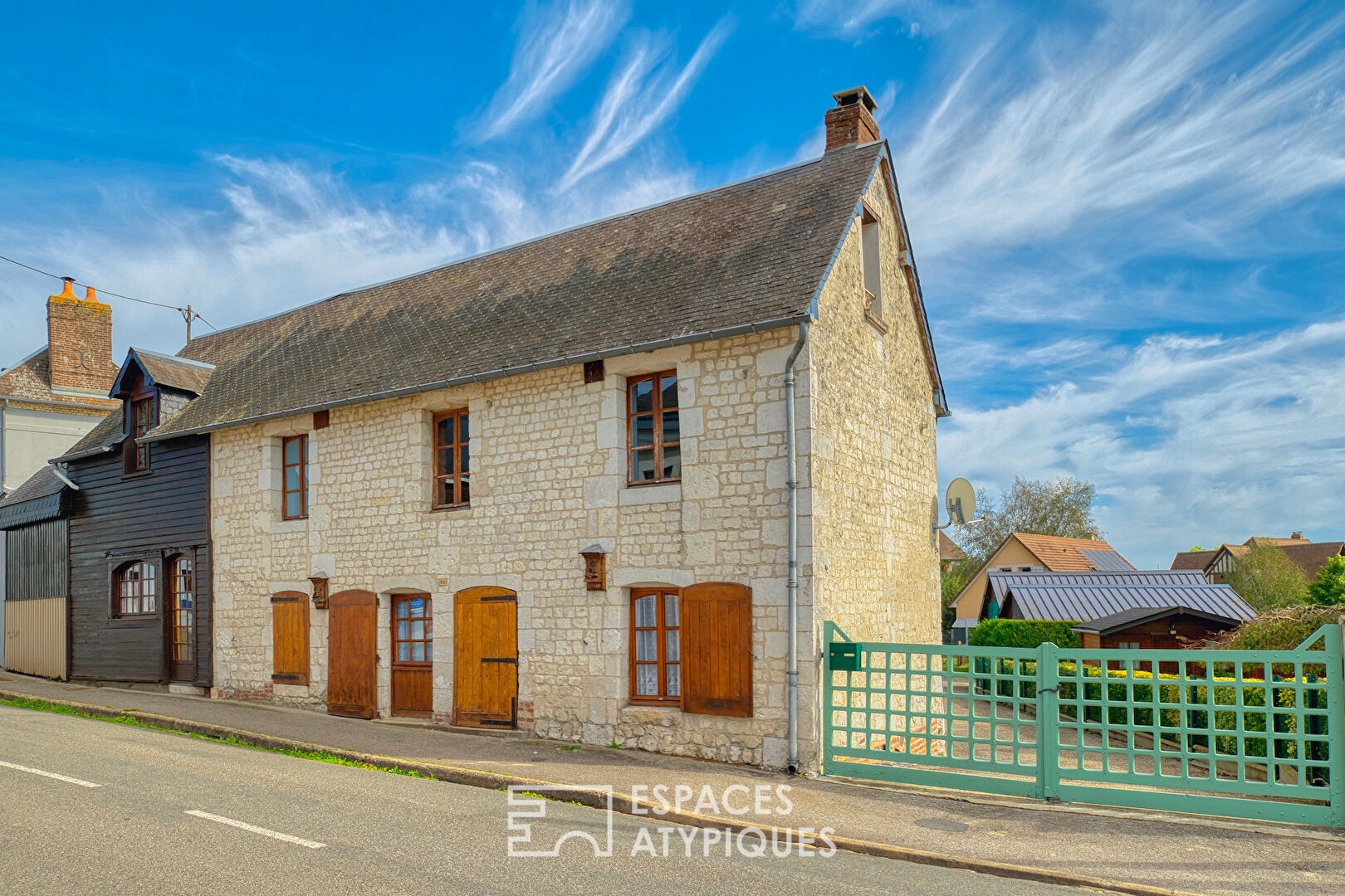 Stone village house with garden from a former business