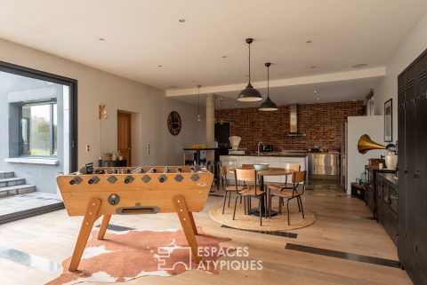 Ancien atelier auto réhabilité en maison contemporaine