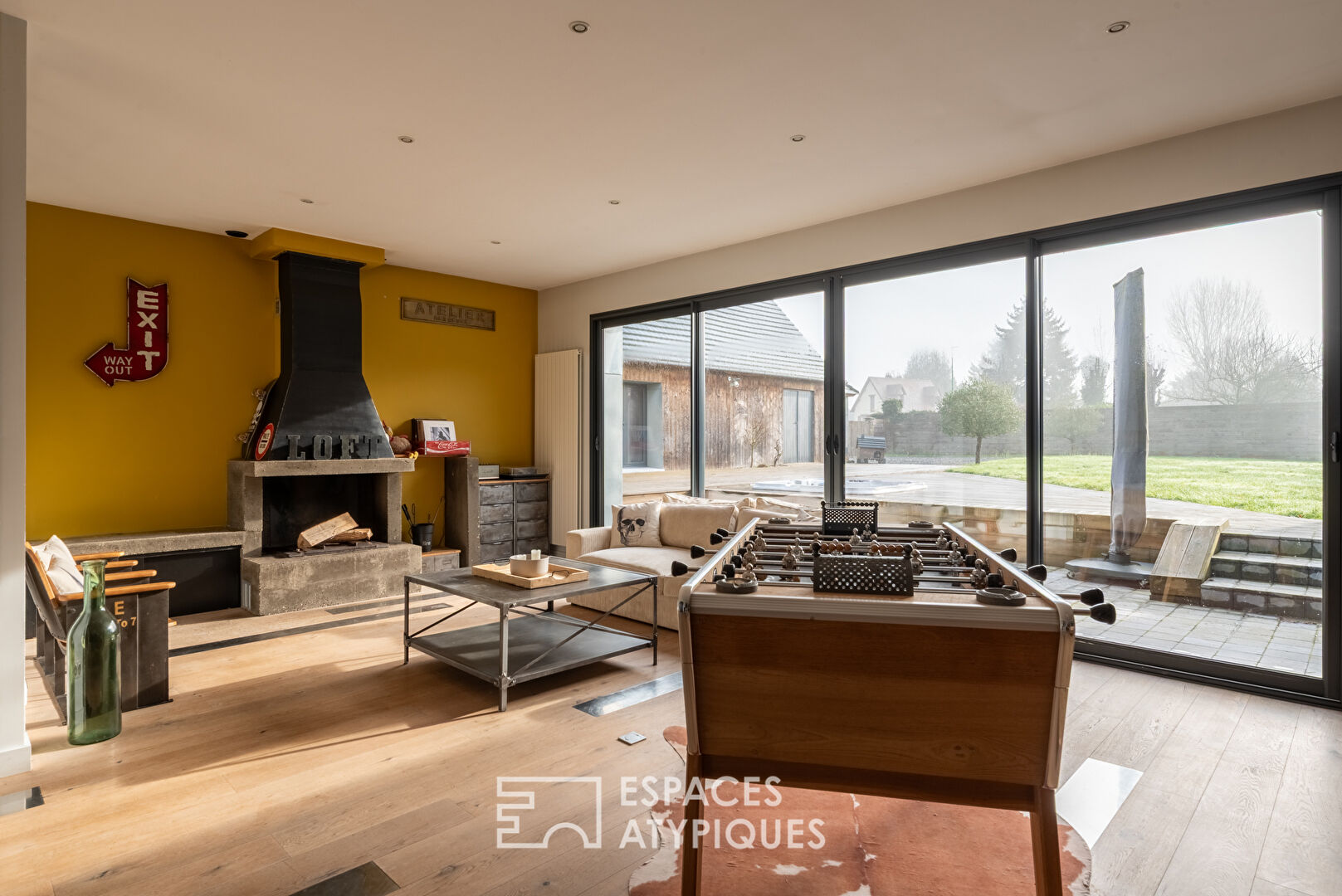 Ancien atelier auto réhabilité en maison contemporaine