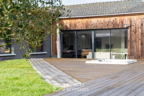Ancien atelier auto réhabilité en maison contemporaine